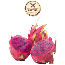 تحميل الصورة في عارض المعرض، Three American Beauty dragon fruit pieces on a white background, including two halves showing bright magenta flesh with dark seeds and one whole fruit with pink skin and green-yellow tips. A circular 'CUTTING' icon appears above.