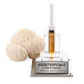 A lion's mane gummies product display featuring a clear plastic syringe filled with golden amber liquid mounted on a clear acrylic stand with a silver base labeled 'AGGietropicals LION'S MANE PREMIUM LIQUID MYCELIUM 10cc'. A large beige lion's mane mushroom is positioned to the left of the stand against a solid white background.