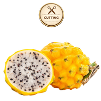 A yellow dragon fruit, shown both whole and halved to reveal a white flesh with black seeds, isolated on a white background with a 'CUTTING' stamp graphic above.