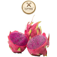 Three American Beauty dragon fruit pieces on a white background, including two halves showing bright magenta flesh with dark seeds and one whole fruit with pink skin and green-yellow tips. A circular 'CUTTING' icon appears above.